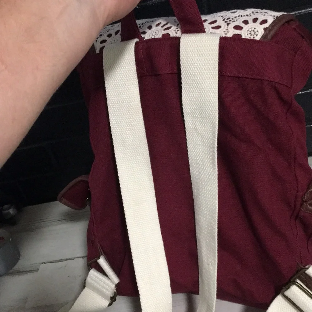Burgundy cloth back pack white handles & white crochet flower overlay on flap